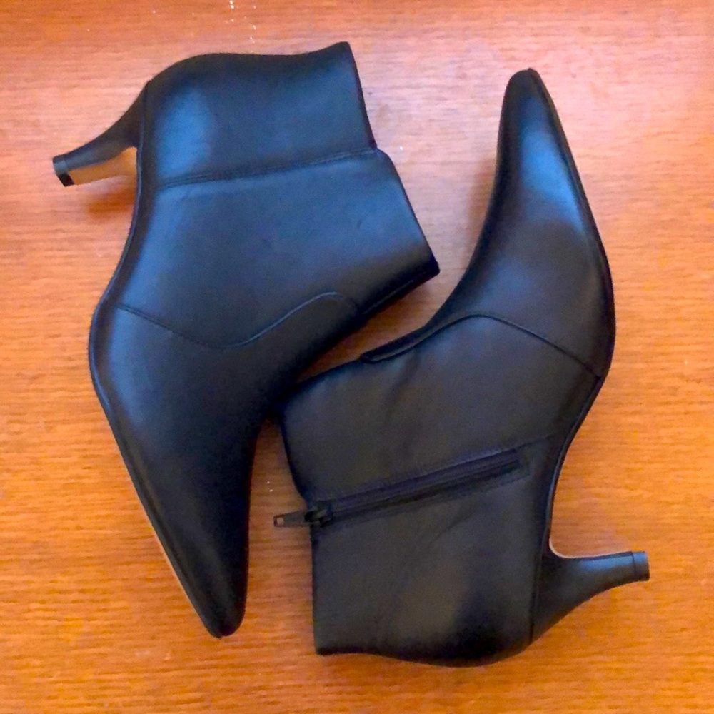 Black leather Clarks booties, 2 inches, zip up sides, never worn, size 8